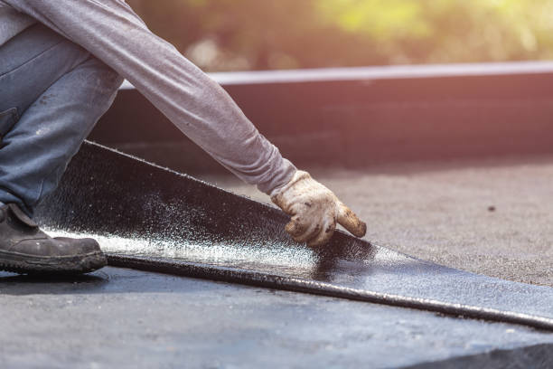 Professional Waterproofing technician working in Oakland, TN